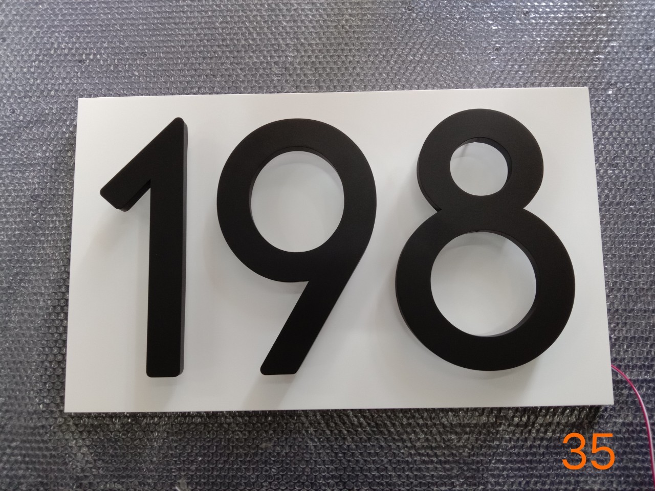 บ้านเลขที่ + ไฟออกหลัง อักษรแสตนเลส สูง 35 cm