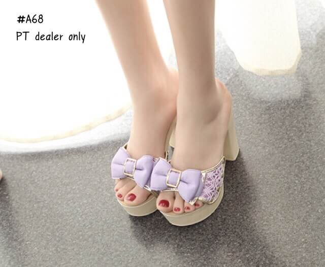 รองเท้าส้นสูงแต่งโบว์ (สีครีม)