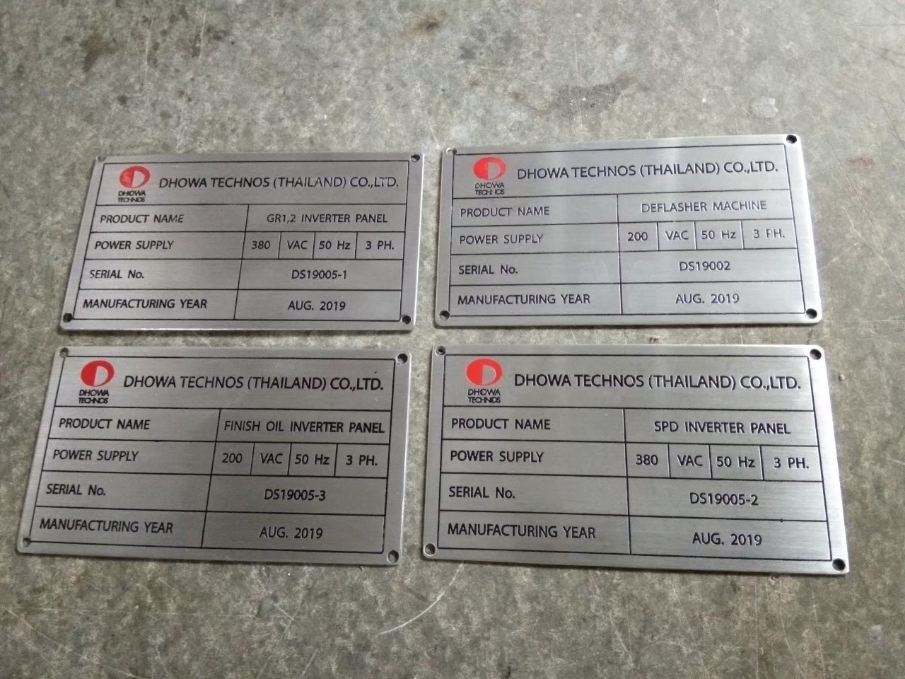 ป้ายเนมเพลทกัดกรด - DHOWA TECHNOS (THAILAND) CO.,LTD