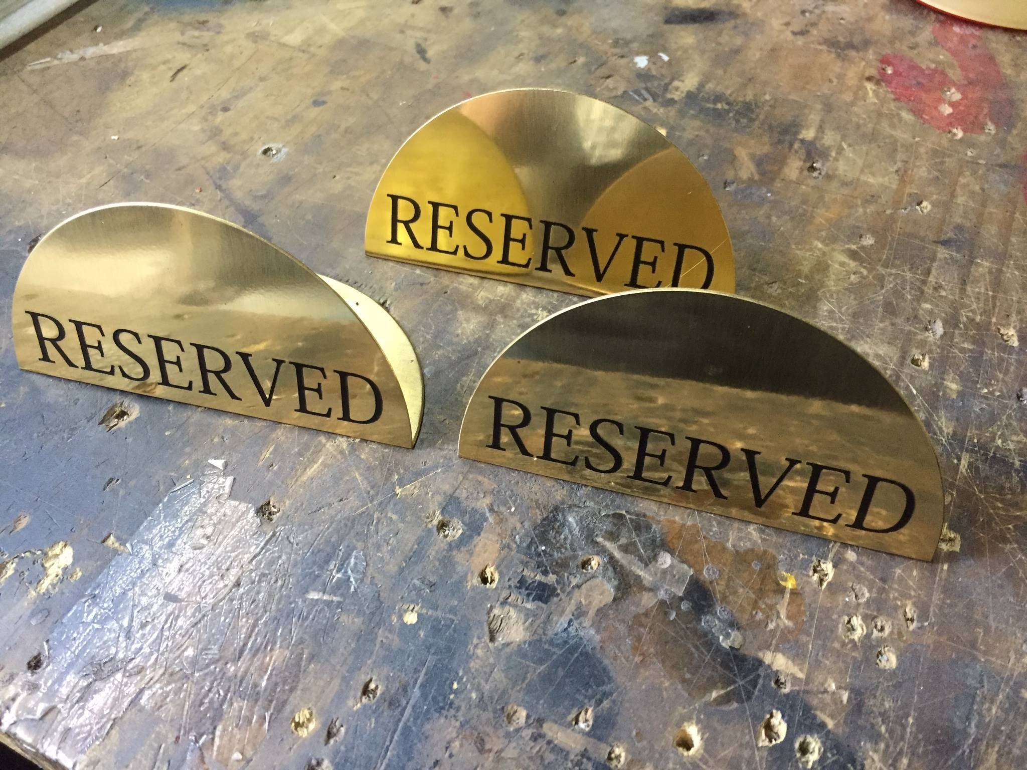 ป้ายทองเหลืองกัดกรด - RESERVED