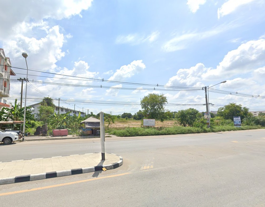 Land for sale, 57.27 rai, on Ban Kao Road, Phan Thong, Chonburi, Thailand, suitable for building factories and warehouses.