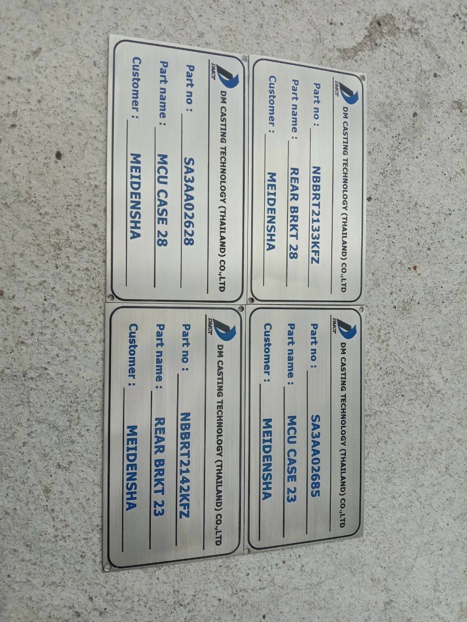 งานป้ายสแตนเลสกัดกรด DM CASTING TECHNOLOGY (THAILAND) CO.,LTD