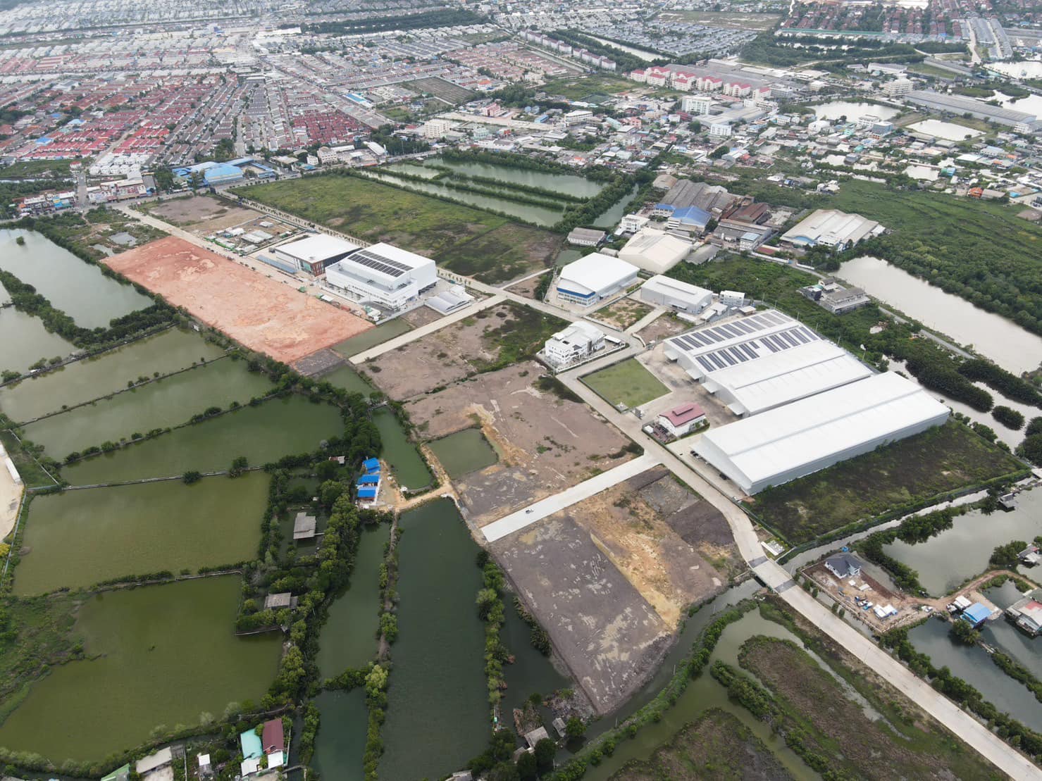 Land for sale in the purple urban planning area, size 3-78 rai, for building an industrial factory in Thailand.