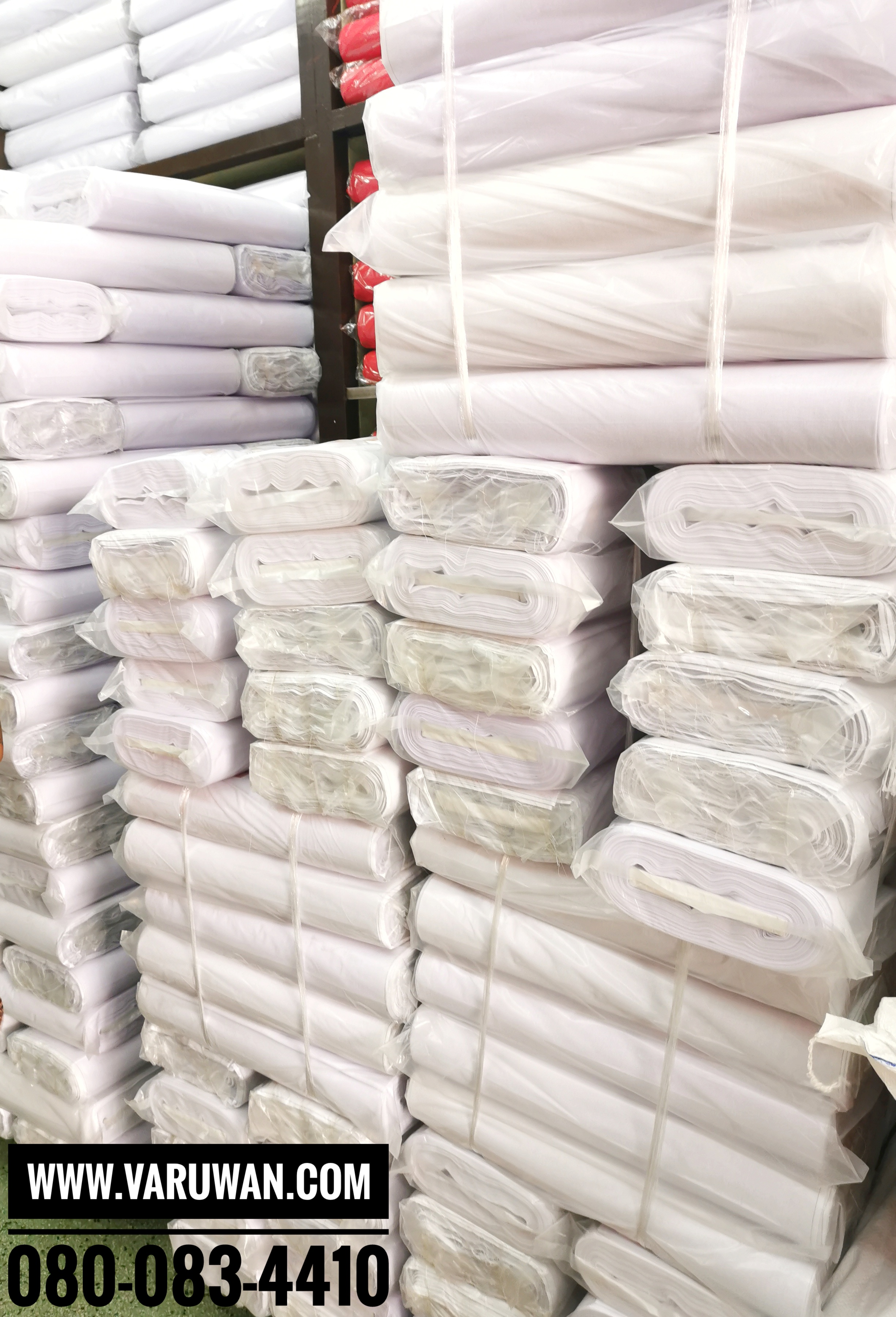 ผ้าขาวพับ ตราแหม่มแดง