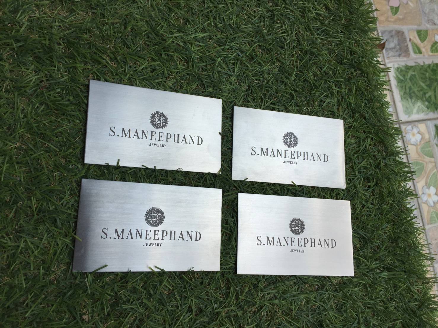ป้ายสแตนเลสกัดกรด logo S.MANEEPHAND JEWELRY