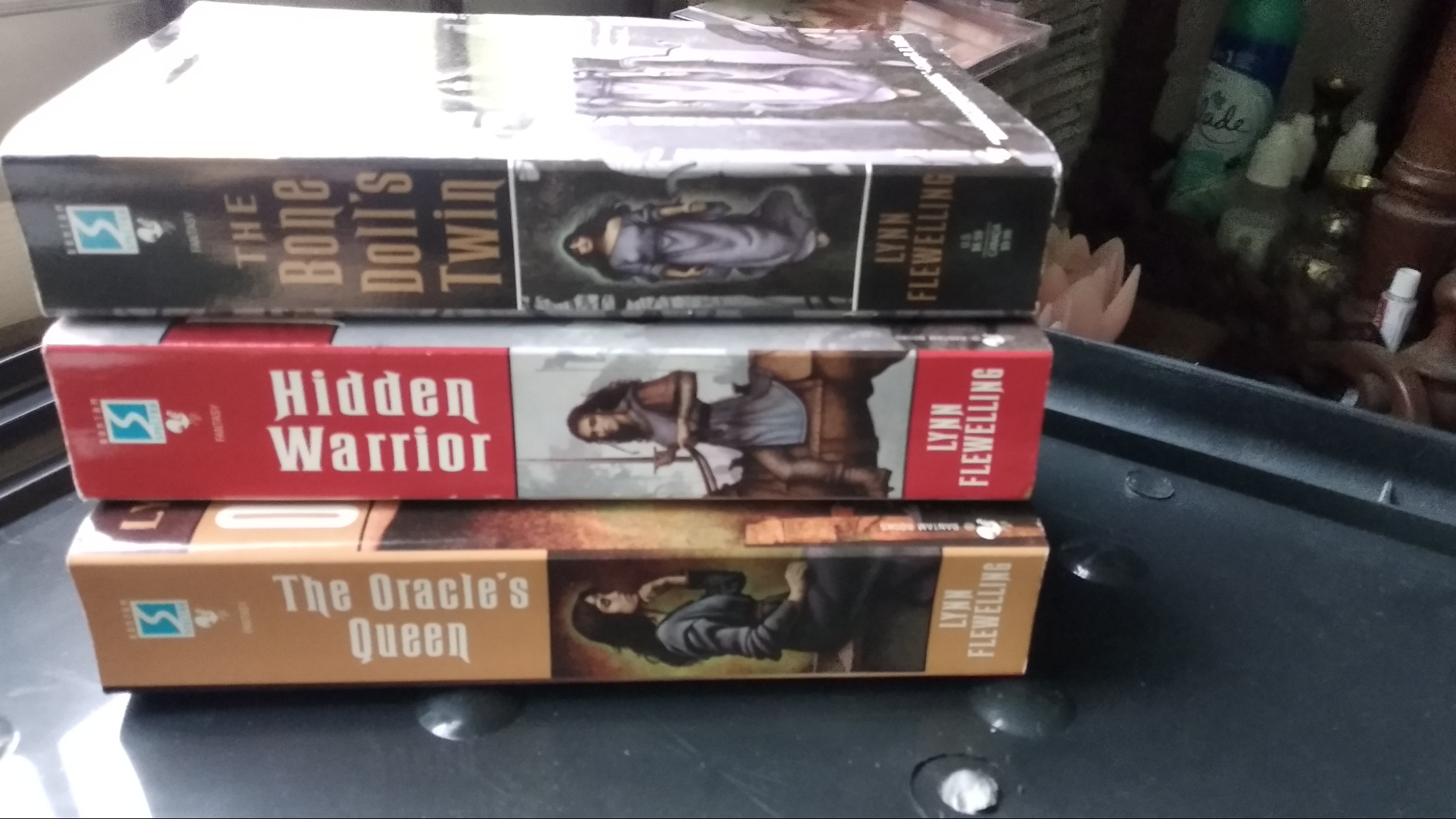 The Bone Doll's Twin, Hidden Warrior, The Oracle's Queen (Tamír Triad v1-3) by Lynn Flewelling
