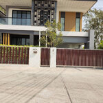 ผลงานติดตั้งประตูตั้วบ้านสแตนเลสโดยใช้สแตนเลสลายไม้